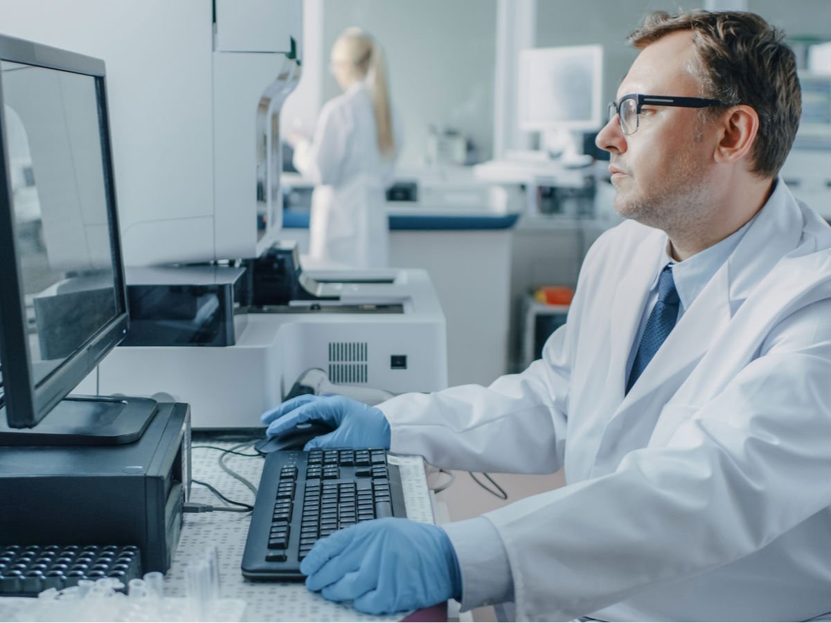 life-sciences-male-research-scientist-sits-workplace.jpg
